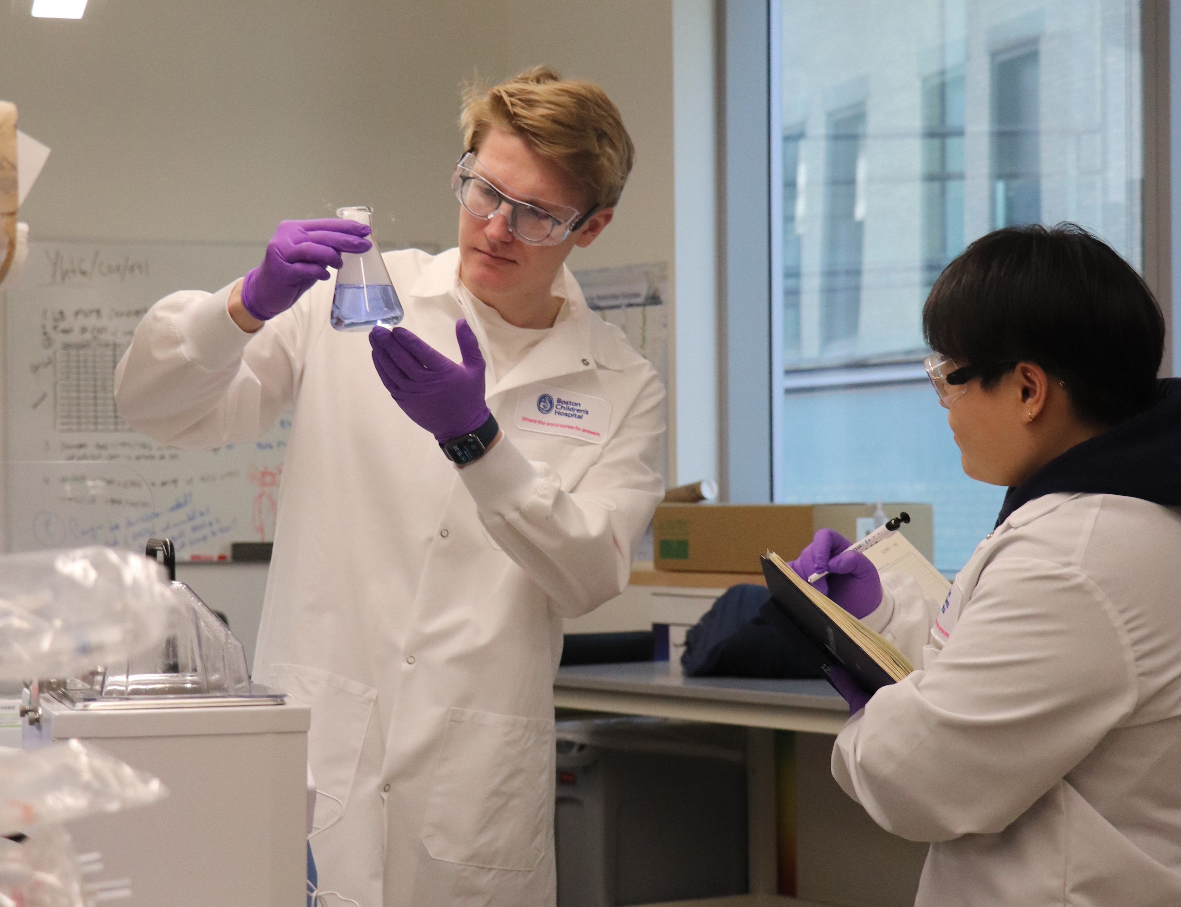 A photo of two SP-CERN researchers.