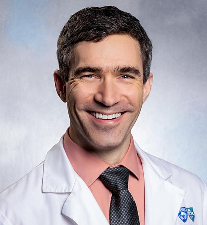 A photo of Chris Cashman, MD, PhD.